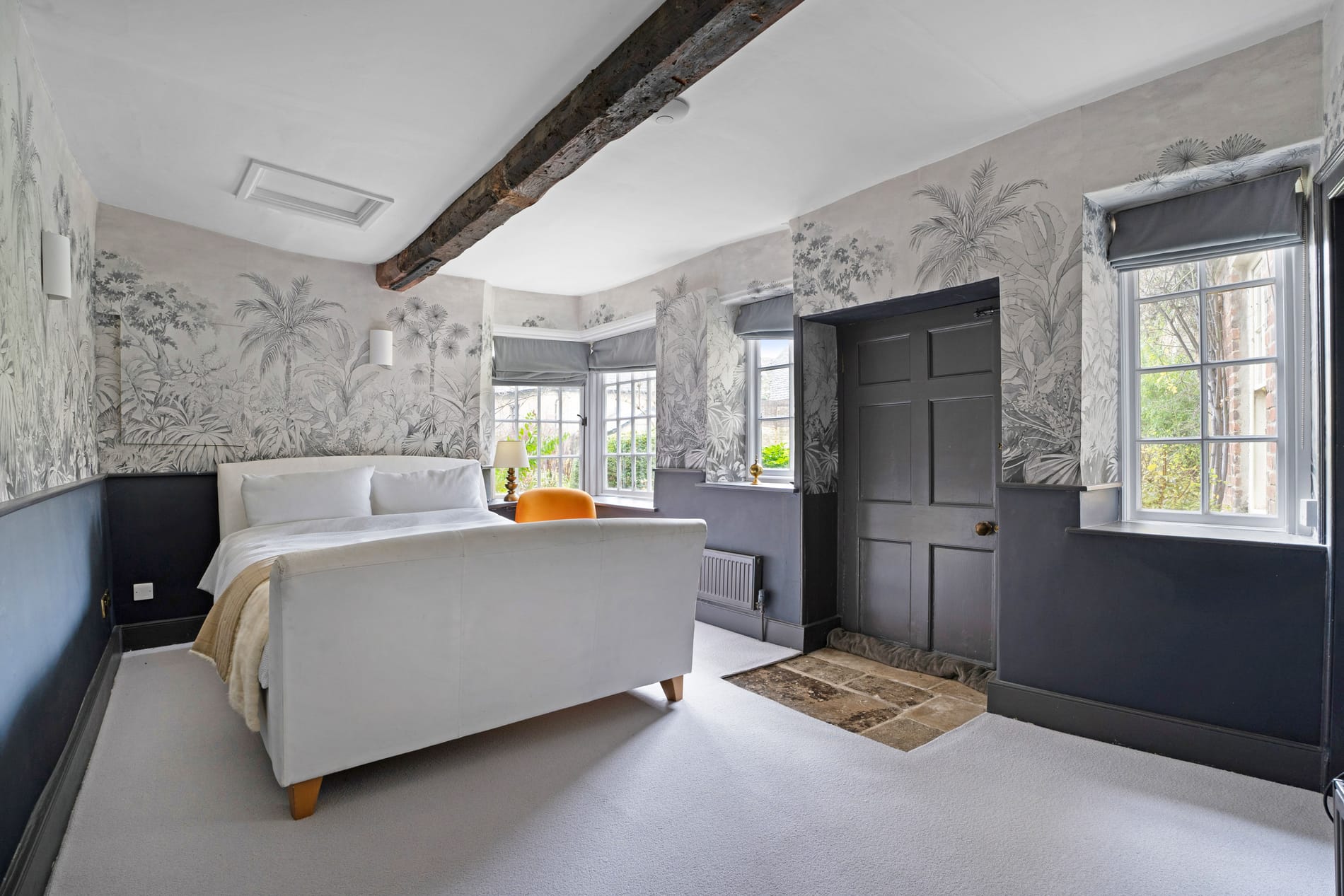 Large King sized bedroom, panelled room with traditional beam