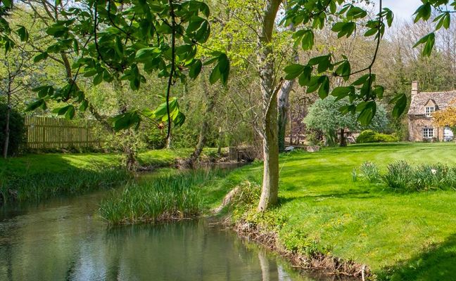 A stream flows through a Cotwolds rental property.